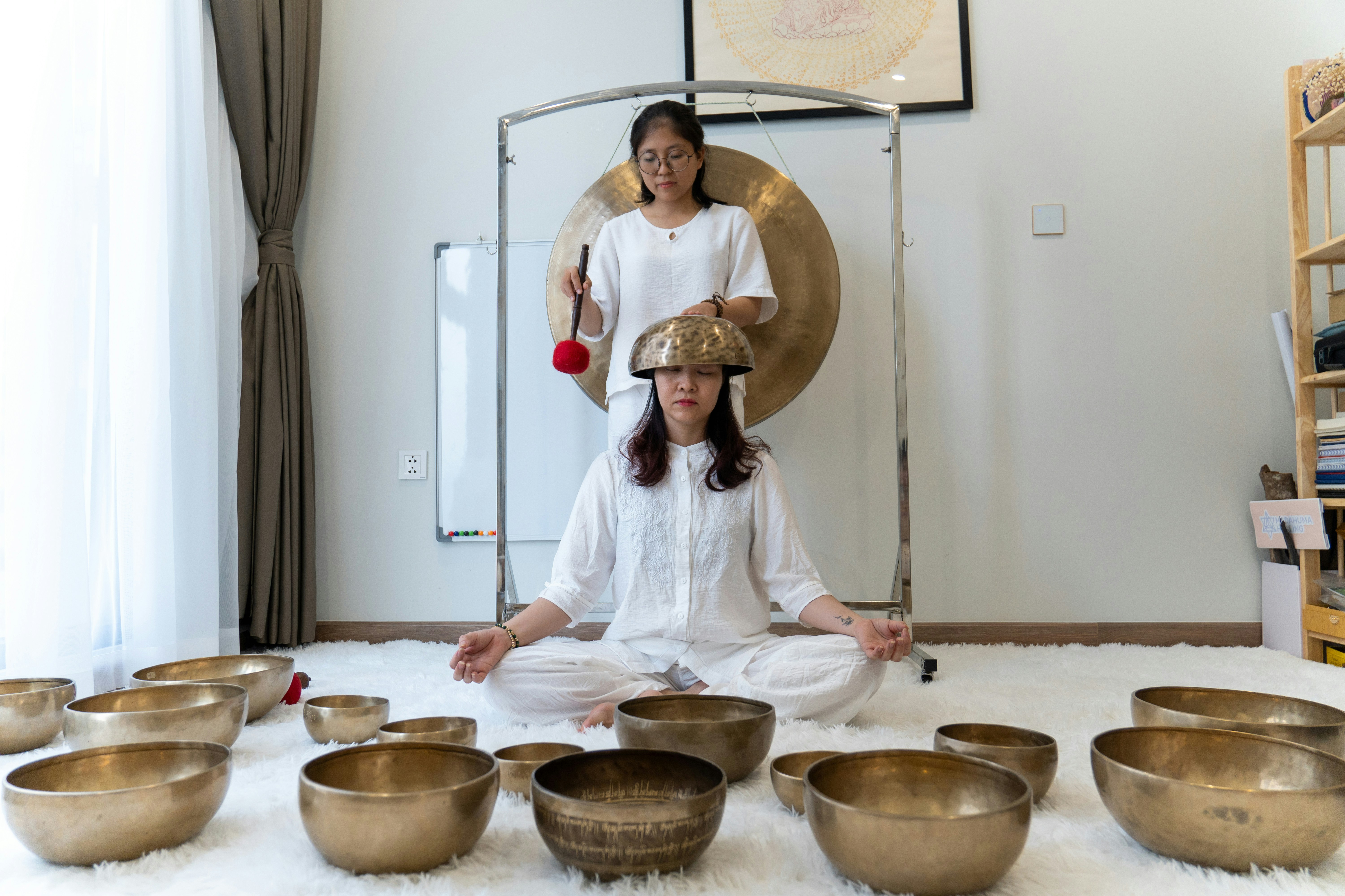 Person in deep meditation during spa session with soft lighting and tranquil atmosphere